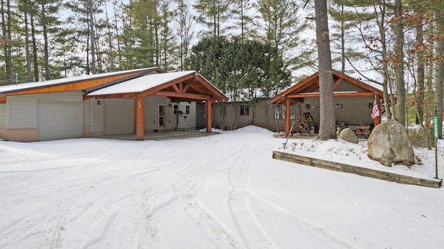 view of front of property with a garage