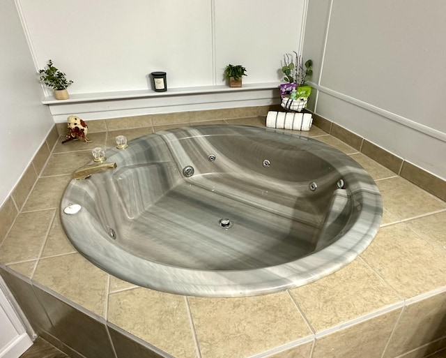 interior details featuring a jacuzzi and a whirlpool tub