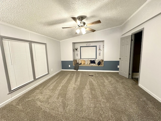 unfurnished bedroom with a textured ceiling, vaulted ceiling, carpet, and ornamental molding