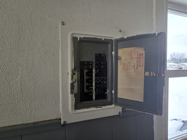 utility room with electric panel