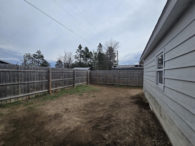 view of yard featuring a fenced backyard