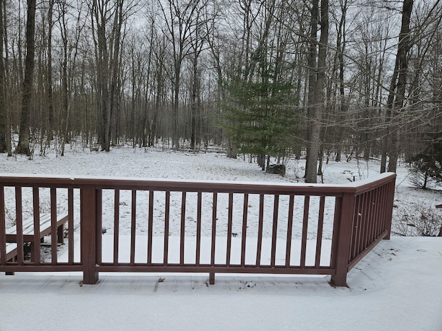 view of snow covered deck