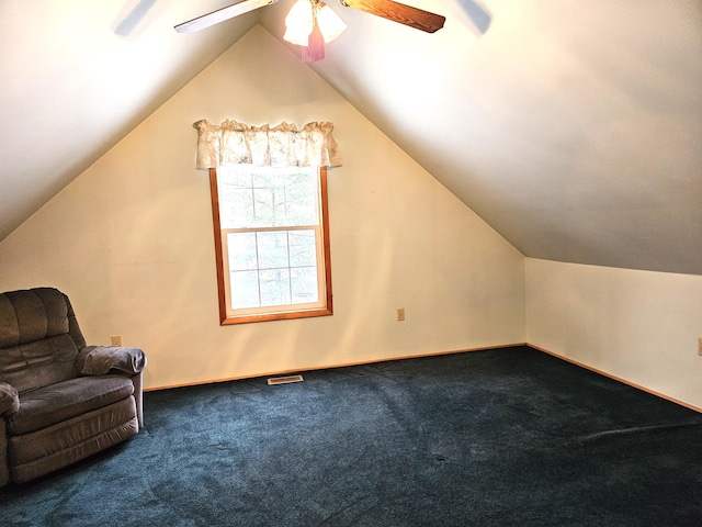 additional living space with visible vents, carpet flooring, baseboards, ceiling fan, and vaulted ceiling