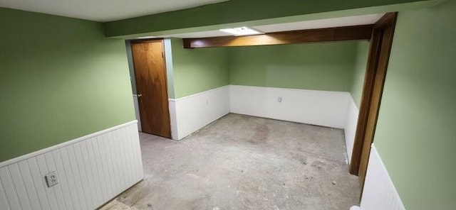 finished below grade area with radiator heating unit