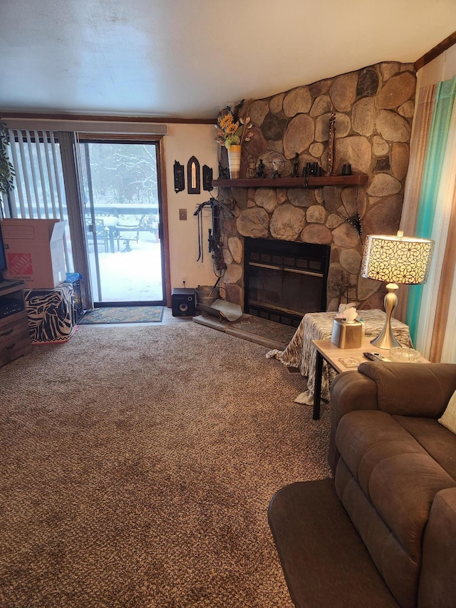 carpeted living room featuring a stone fireplace