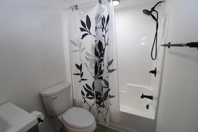 full bath featuring toilet and shower / tub combo with curtain