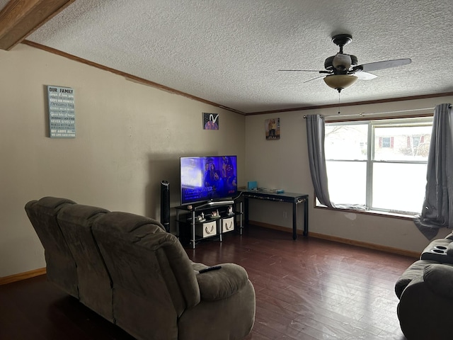 living room featuring ceiling fan, ornamental molding, vaulted ceiling, hardwood / wood-style flooring, and a textured ceiling