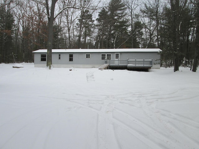 view of front of home with a wooden deck