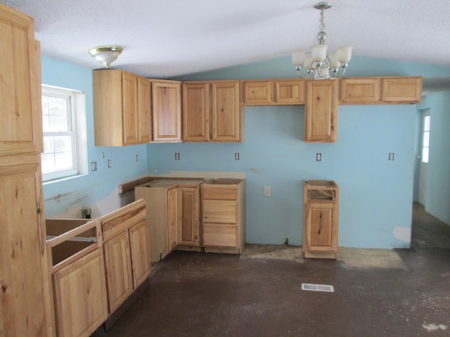 kitchen featuring visible vents, a notable chandelier, pendant lighting, light brown cabinets, and vaulted ceiling