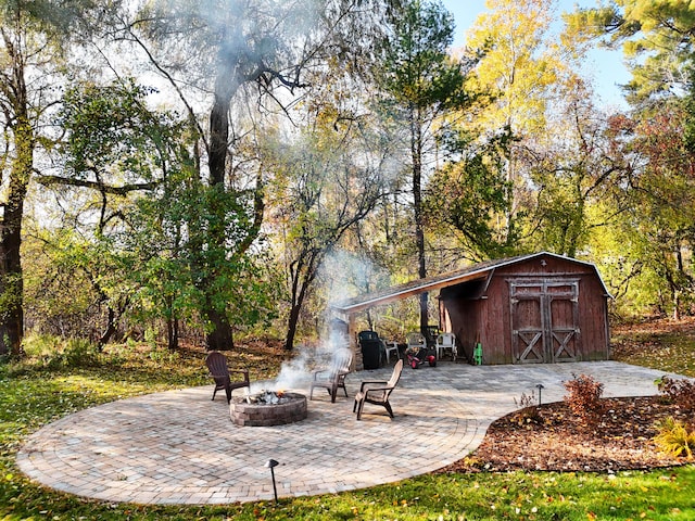 exterior space featuring an outdoor fire pit