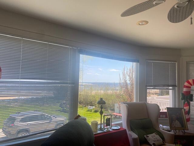 424 S State Ave, Alpena, MI 49707 - office featuring a healthy amount of sunlight and a ceiling fan