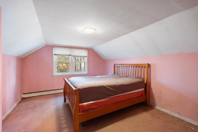 bedroom with baseboards, lofted ceiling, baseboard heating, and carpet floors