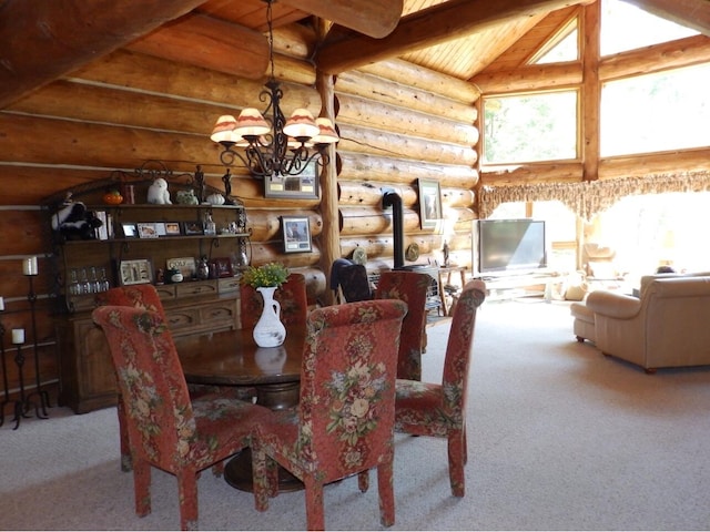 carpeted dining room featuring wood ceiling, vaulted ceiling with beams, an inviting chandelier, and a wood stove