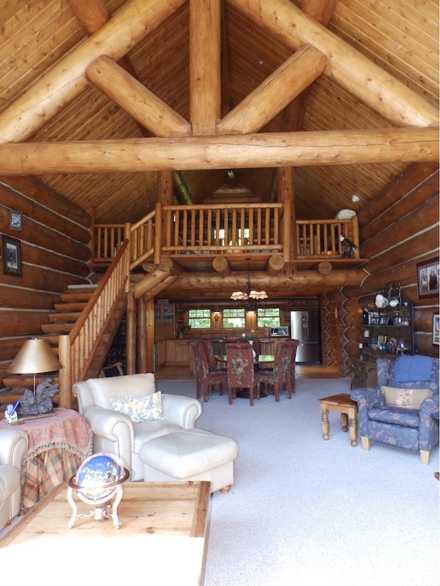 carpeted living room featuring beam ceiling, wooden ceiling, and high vaulted ceiling