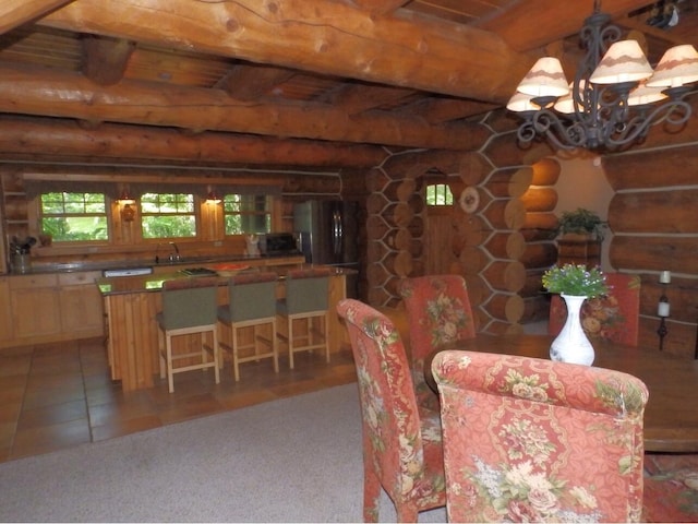 tiled dining room featuring beam ceiling, plenty of natural light, a chandelier, and log walls