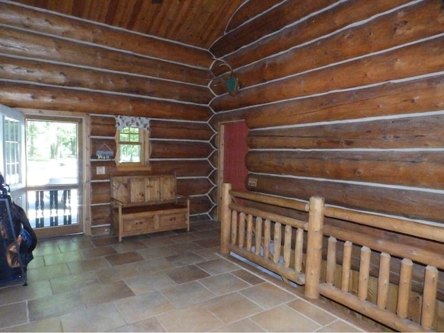 interior space featuring rustic walls