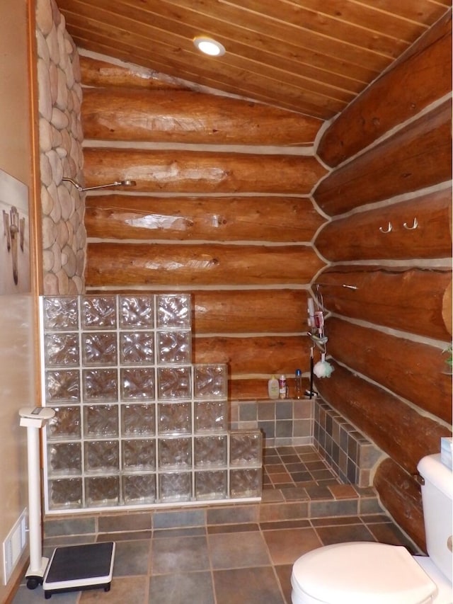 full bath featuring visible vents, toilet, wood ceiling, and tiled shower