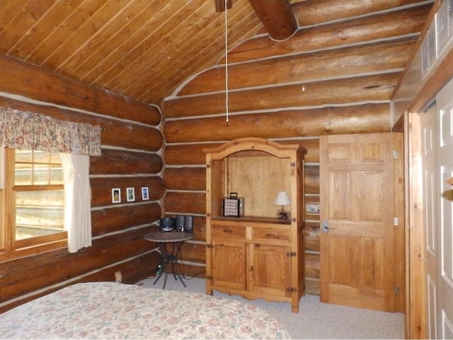 bedroom featuring wood ceiling, carpet flooring, and vaulted ceiling with beams