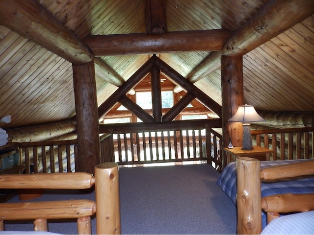 unfurnished bedroom with rustic walls, wood ceiling, lofted ceiling with beams, and carpet floors