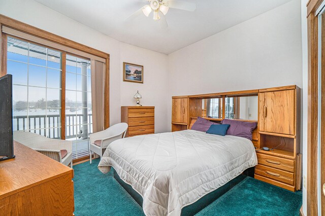 5560 Chestnut Dr, Cheboygan, MI 49721 - carpeted bedroom featuring access to exterior and a ceiling fan