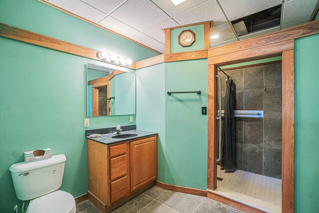 5560 Chestnut Dr, Cheboygan, MI 49721 - full bath featuring tiled shower, toilet, vanity, and baseboards
