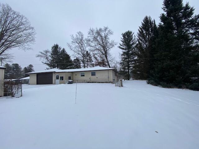 view of snow covered house