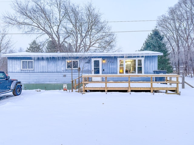 view of front of property with a wooden deck