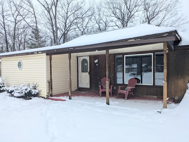 view of snow covered property