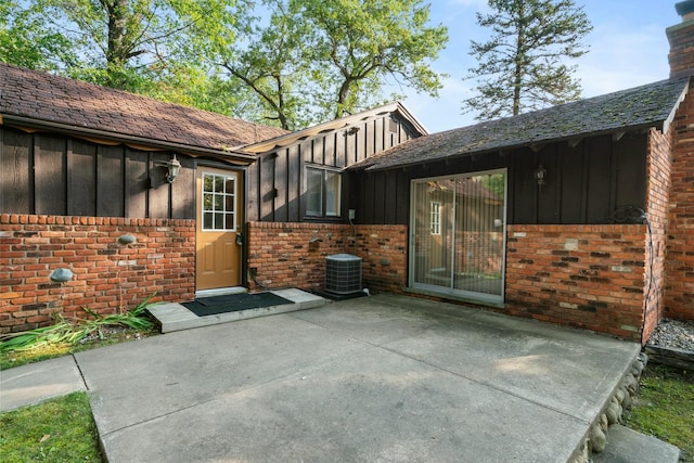 4878 S Straits Hwy, Indian River, MI 49749 - view of patio / terrace featuring cooling unit