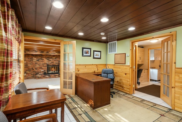 4878 S Straits Hwy, Indian River, MI 49749 - office area with visible vents, brick wall, wood ceiling, french doors, and wainscoting