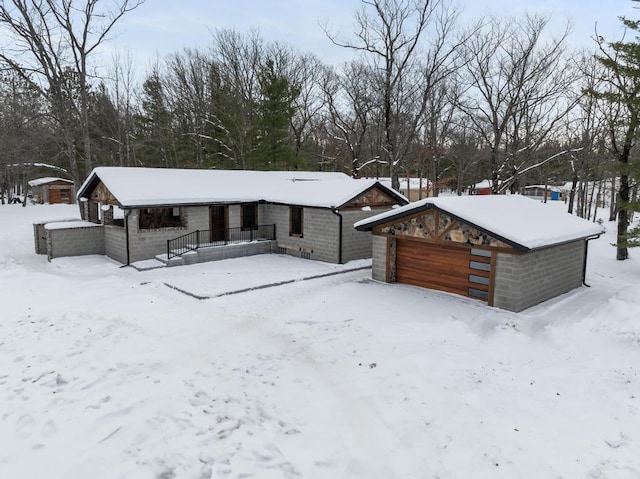 view of front of property with a garage