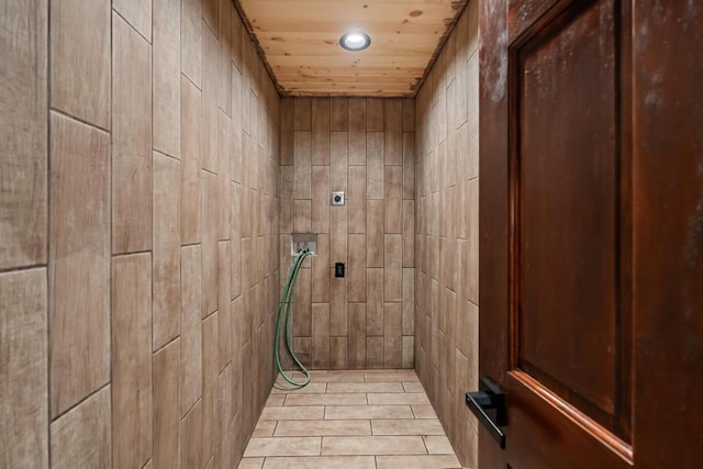 bathroom with wood ceiling