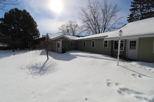 view of snow covered property