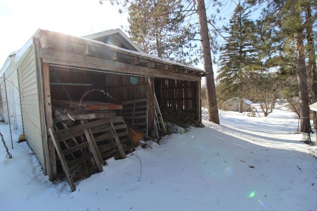 view of snow covered garage