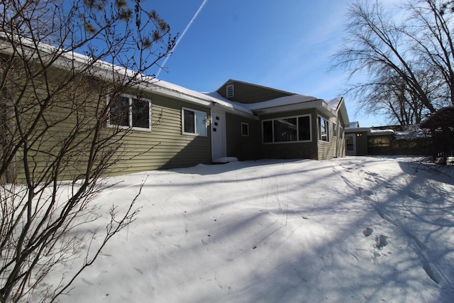 view of snow covered property