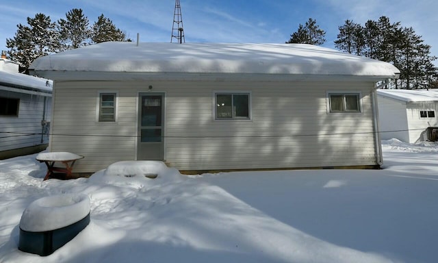 view of snow covered house