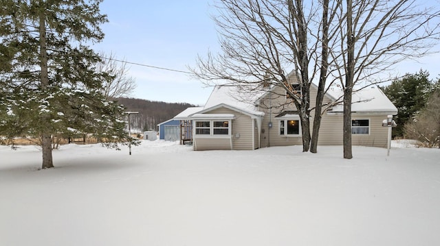 view of front facade featuring a sunroom