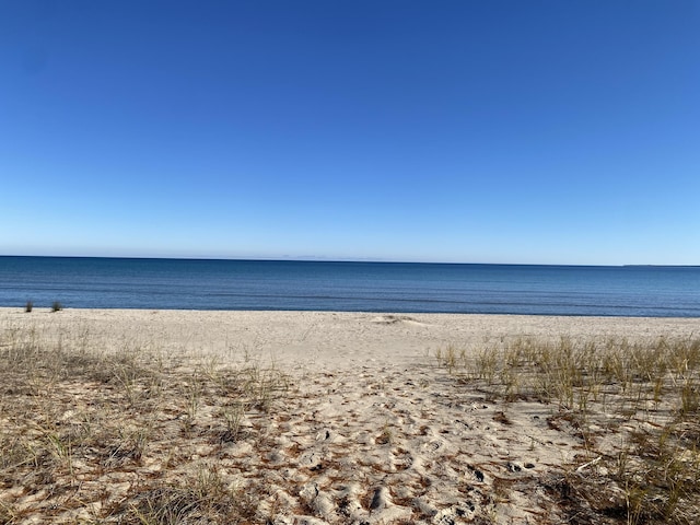 property view of water featuring a view of the beach