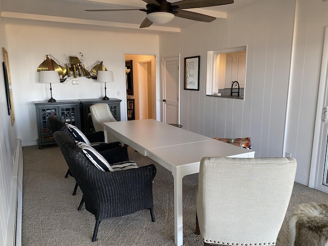 home office featuring light colored carpet and ceiling fan