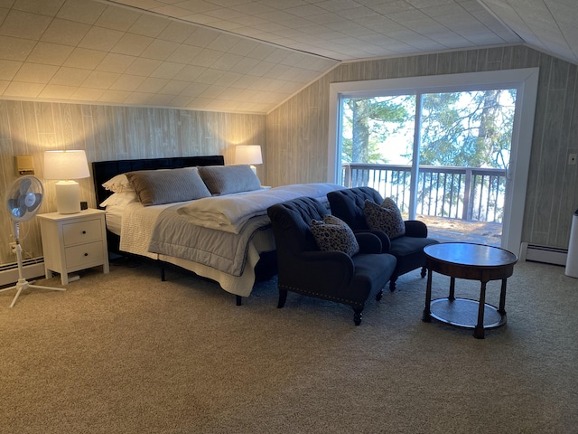 bedroom featuring a baseboard radiator, carpet floors, and vaulted ceiling