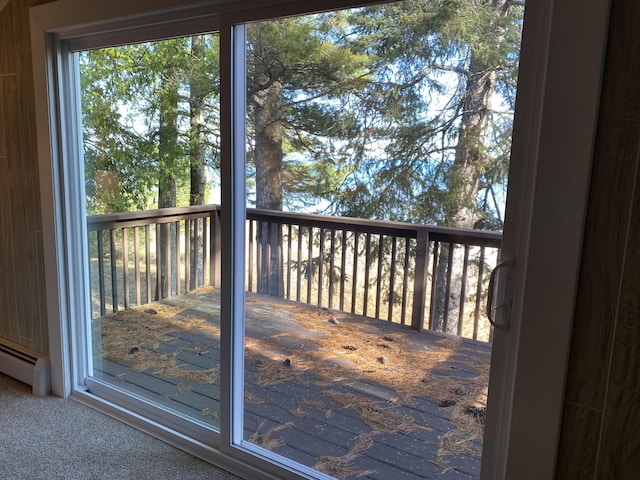 wooden deck featuring baseboard heating