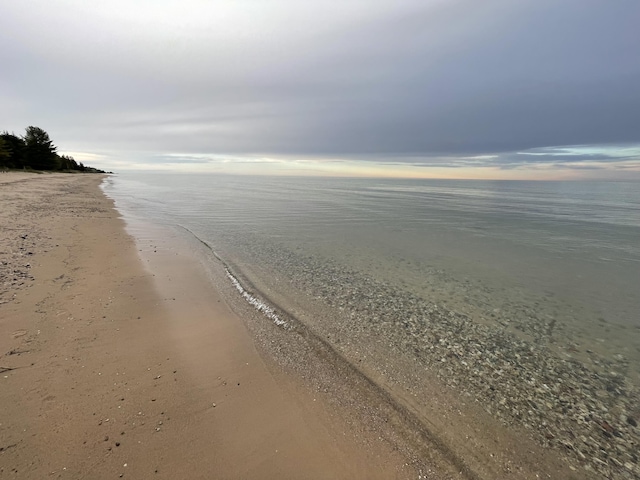 property view of water with a beach view