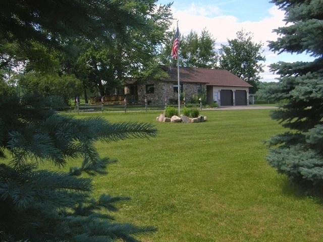 view of yard with an attached garage