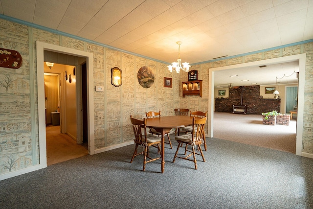 3222 E Houghton Lake Dr, Houghton Lake, MI 48629 - dining room featuring carpet flooring and a chandelier