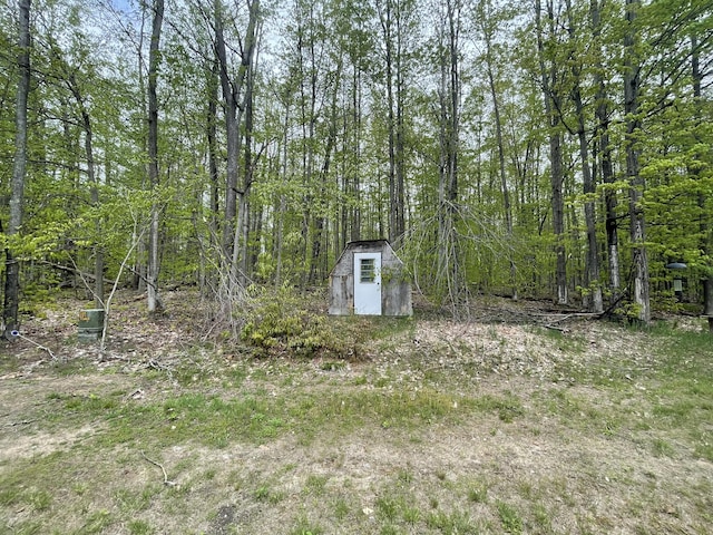8598 N Sherman Rd, Frederic, MI 49733 - view of yard with a view of trees