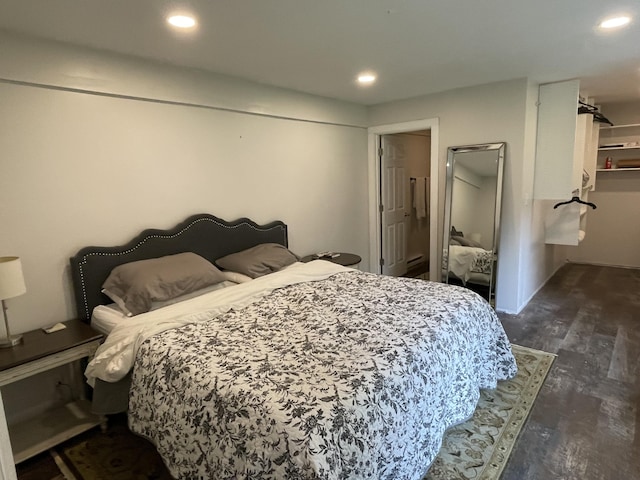 8598 N Sherman Rd, Frederic, MI 49733 - bedroom featuring wood finished floors and recessed lighting