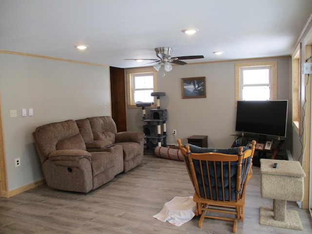 6876 Old Alba Rd, Gaylord, MI 49735 - living area featuring a ceiling fan, baseboards, recessed lighting, and wood finished floors