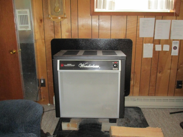6876 Old Alba Rd, Gaylord, MI 49735 - interior details with wooden walls and heating unit