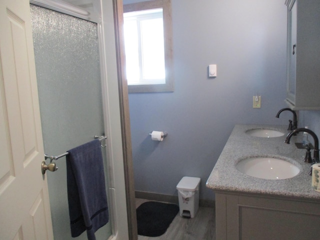 6876 Old Alba Rd, Gaylord, MI 49735 - full bathroom with a sink and double vanity