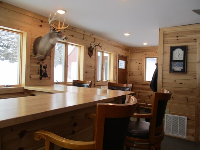 6876 Old Alba Rd, Gaylord, MI 49735 - dining space featuring visible vents, recessed lighting, and plenty of natural light